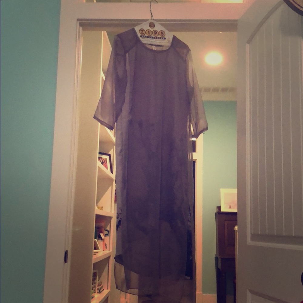 Cocktail dress with sheer overlay